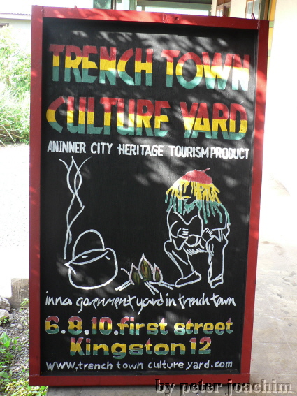 Trench Town Culture Yard - Koch Georgie - Werbetafel vom Yard